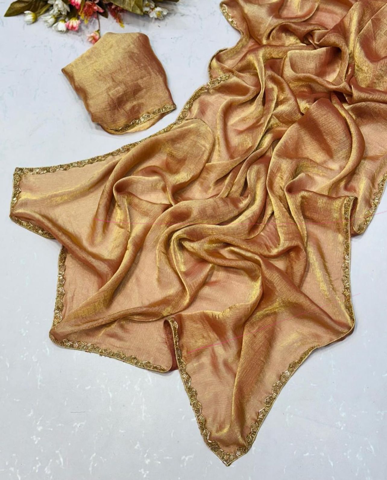 Golden shimmery party wear saree